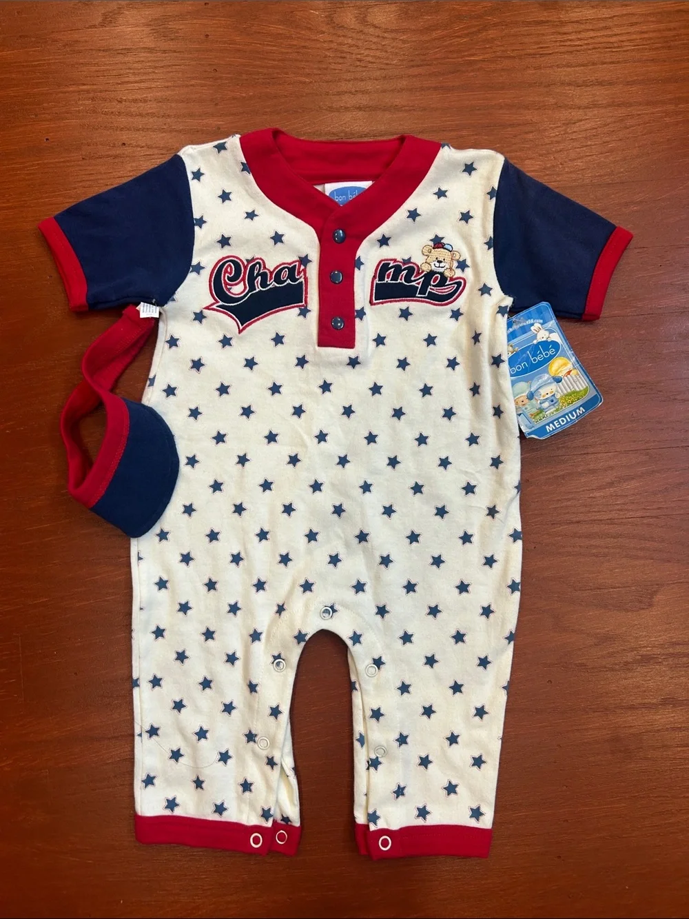 Bon Bebe Cream One-Piece with Navy Stars and Red Trim